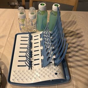 Glass baby bottles and drying rack